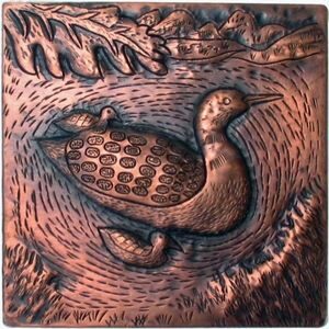 copper tile with a duck design