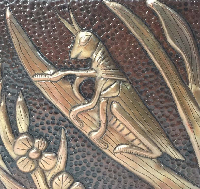 Copper tile with grasshopper design