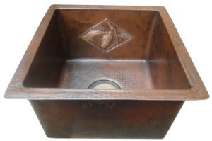 copper bar sink with tile design
