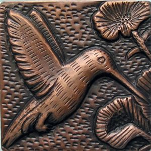 Copper tile with humming bird design